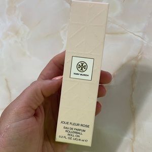 New never opened roll on Tory Burch Jolie fleur Rose perfume